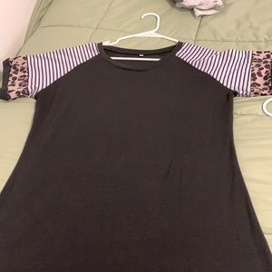 Size large women’s top; has no brand name